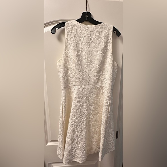 Anthropologie Dresses & Skirts - Anthropologie white skater dress with lace detail and pockets, size 10.